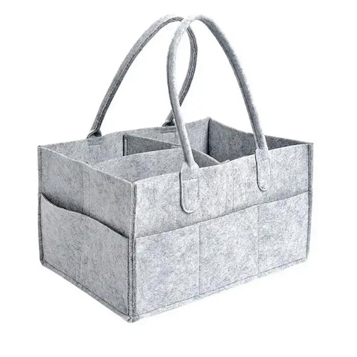 Sac à couches pour bébé, sac de support portable, table de changement et boîte de rangement des esse