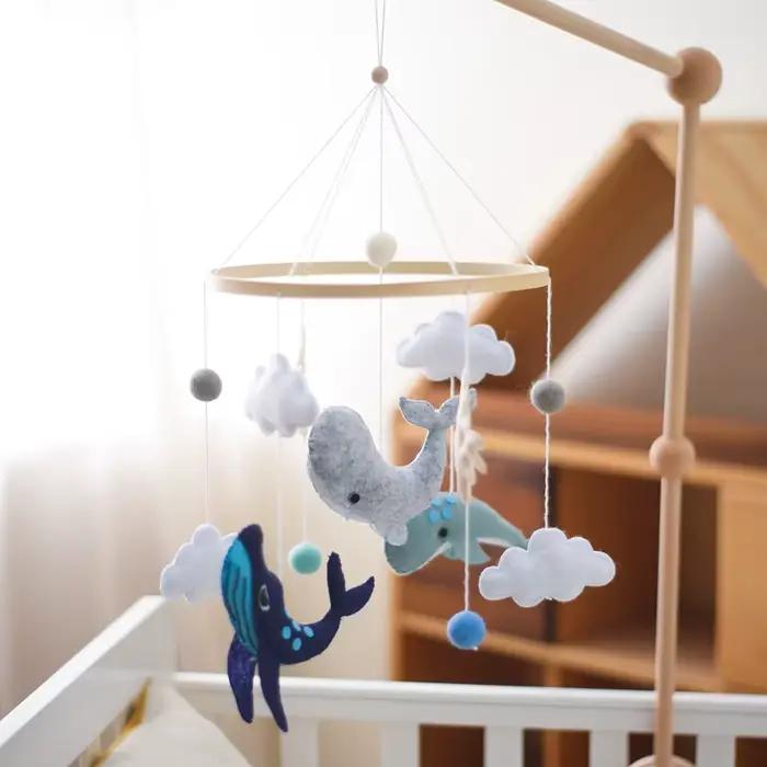 Cloche de lit en bois pour bébé