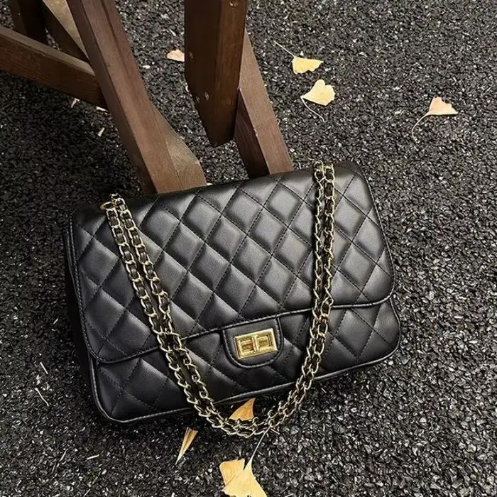 Sac à langer polyvalent pouvant servir de sac fourre-tout, de sac bandoulière ou de sac de poussette