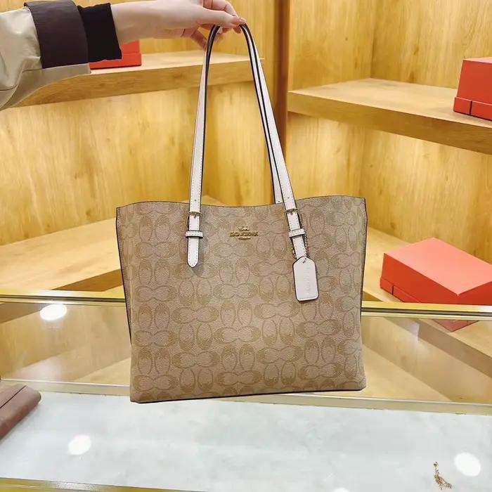 Sac à langer bandoulière tendance en cuir haut de gamme, style classique de créateur, décontracté, s