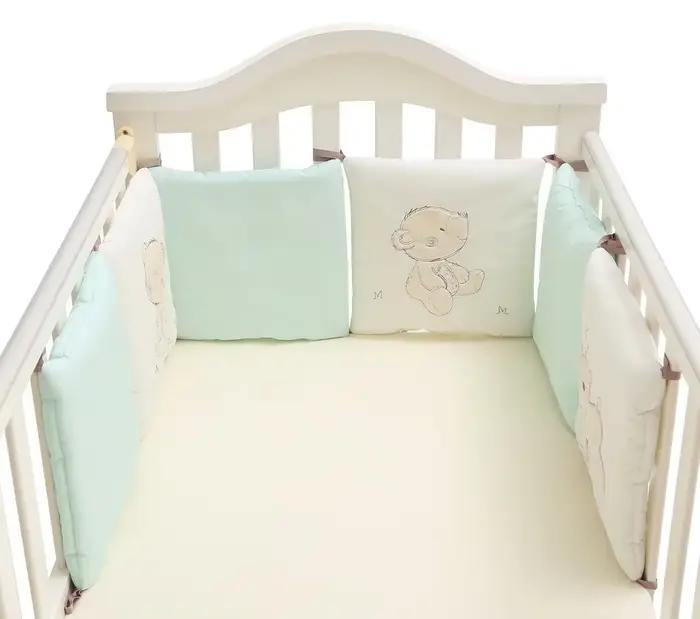 Coussinets de protection pour lit de bébé