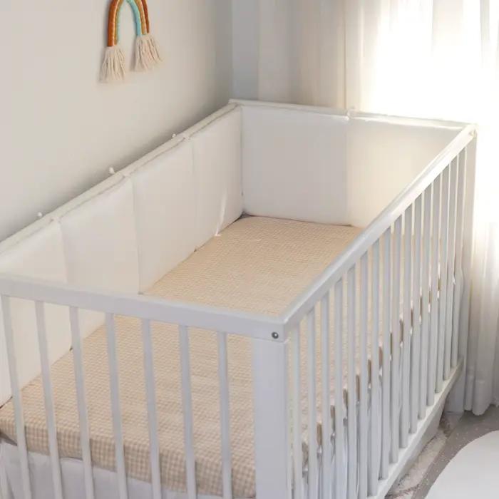 Pare-chocs pour lit de bébé